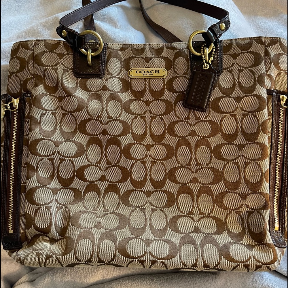 Authentic Coach tote bag in rich brown with classic C monogram.